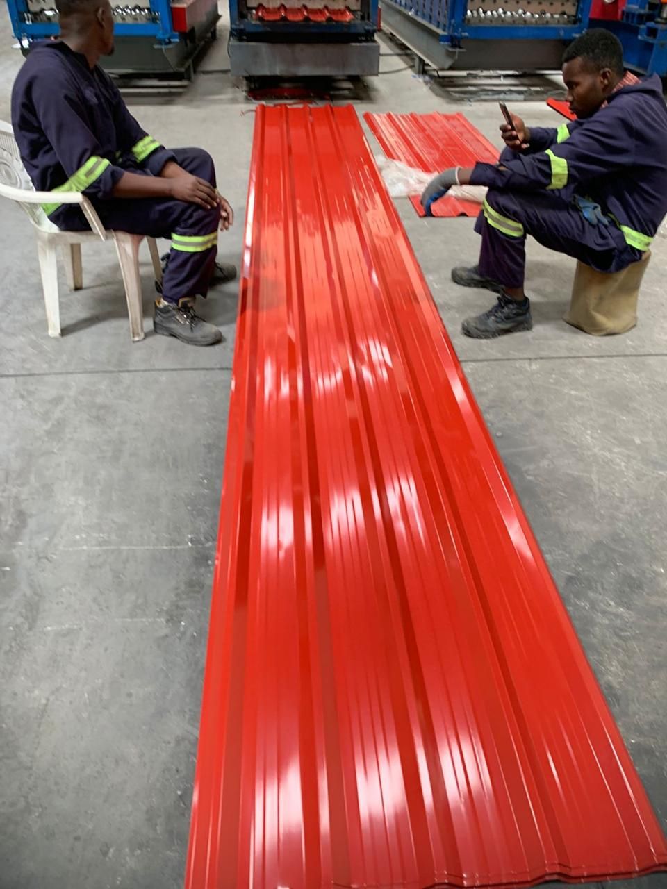 Freshly rolled red box profile mabati sheets at the Belinate yard